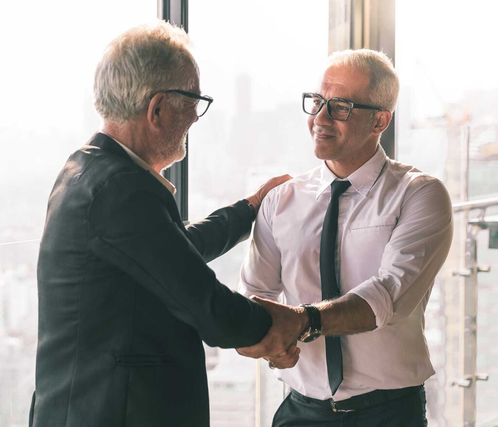 Experienced professionals collaborating in a modern workspace